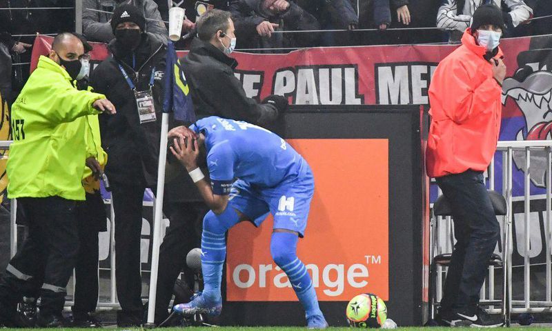 Marseille's Dimitri Payet was struck on the head by a bottle of water thrown from the crowd as he went to take a corner in the Ligue 1 game against Lyon last month