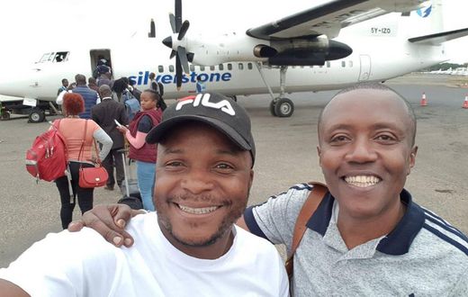 Classic 105 FM presenter Maina Kageni with Kiss 100 FM's Jalang'o