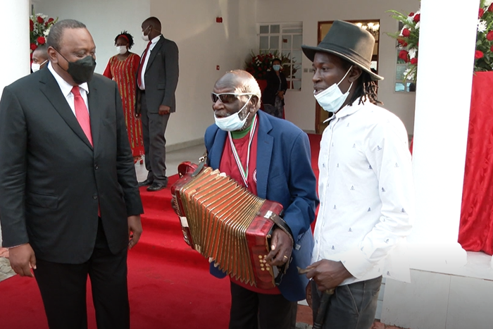 Kikuyu musician Paul Mutonga alias Wanganangu performs for President Uhuru Kenyatta during the 2021 Mashujaa Day luncheon