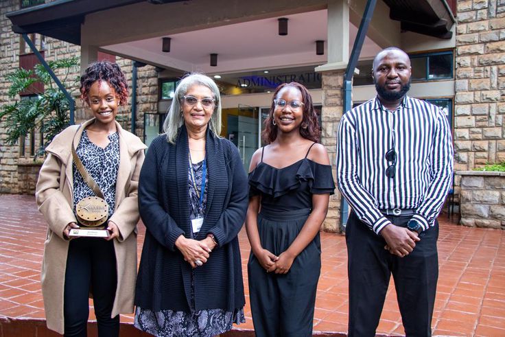 L-R: Steph Sevani, Director, House of Secrets, Prof. Freida Brown, Vice Chancellor, Michelle Donde, Director, House of Secrets, Alfred Obi, Casting Director / Assistant Director, House of Secrets pose with their award. House of Secrets won in the categ...