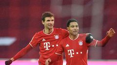 Thomas Mueller (L) and Serge Gnabry (R) returned to Bayern Munich training on Thursday