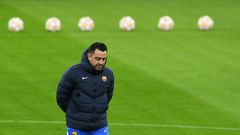 Xavi at a training session before facing Bayern Munich