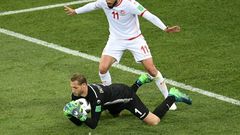 Esperance goalkeeper Farouk Ben Mustapha (L) playing for Tunisia against England at the 2018 World Cup in Russia.