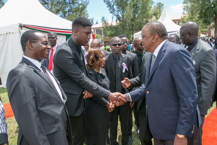 Marco Laboso with President Uhuru Kenyatta during the funeral of the Late Joyce Laboso