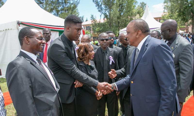 Marco Laboso with President Uhuru Kenyatta during the funeral of the Late Joyce Laboso