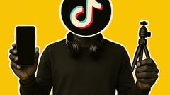 A digital pop-art collage of a creator holding a smartphone and a mini tripod, symbolising the modern hustle of TikTok content creation.