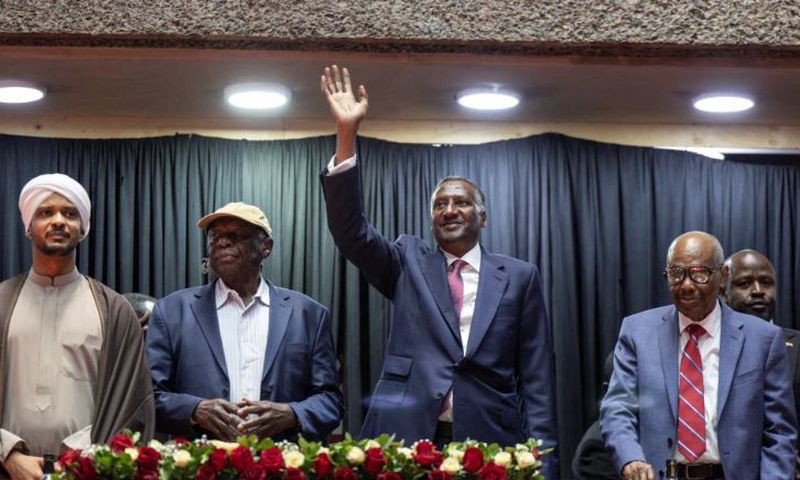 Abdul Rahim Hamdan Dagalo (C), Sudan's Rapid Support Forces deputy commander and brother to Mohamed Hamdan Dagalo (also known as Hemedti), flanked by representatives of other political parties affiliated to Sudan's Rapid Support Forces (RSF)