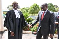 File image of Nick Ruto with his father in 2019