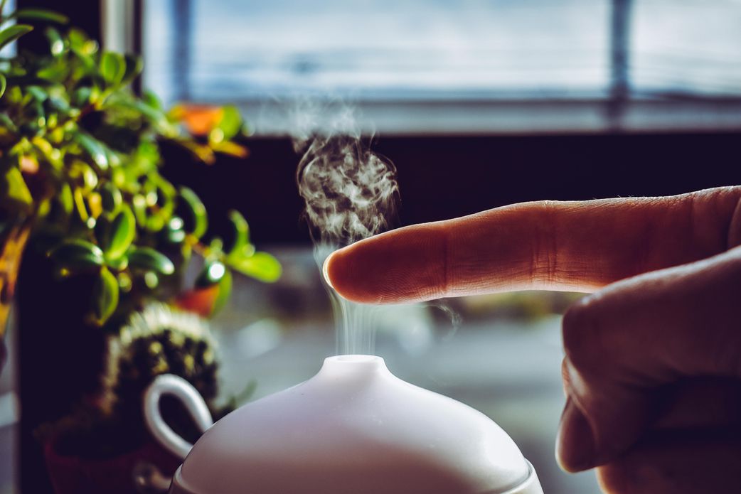 Essential oil diffuser with warming scents