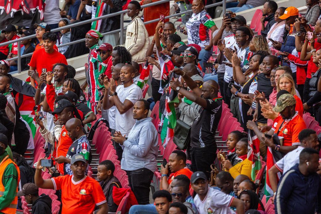 Fans cheering Harambee Stars at Moi International Sports Centre, Kasarani