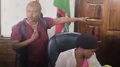 Grace Njoki Mulei (in maroon) protesting against the SHA at the Ministry of Health Headquarters