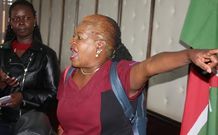 Grace Njoki Mulei (in maroon) protesting against the SHA at the Ministry of Health Headquarters