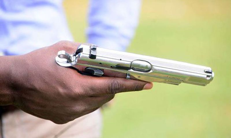 A man holding a gun