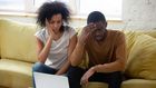 A young couple seemingly worried