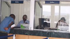 Tellers in a Kenyan bank