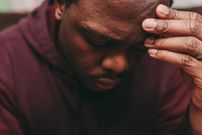 A man undergoing mental stress