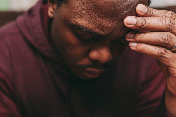 A man undergoing mental stress