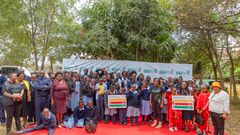 GGI founder Elizabeth Wathuti with students of Tree Side Special School Kasarani