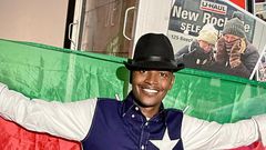 Samidoh holding the Kenyan flag