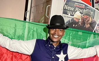 Samidoh holding the Kenyan flag