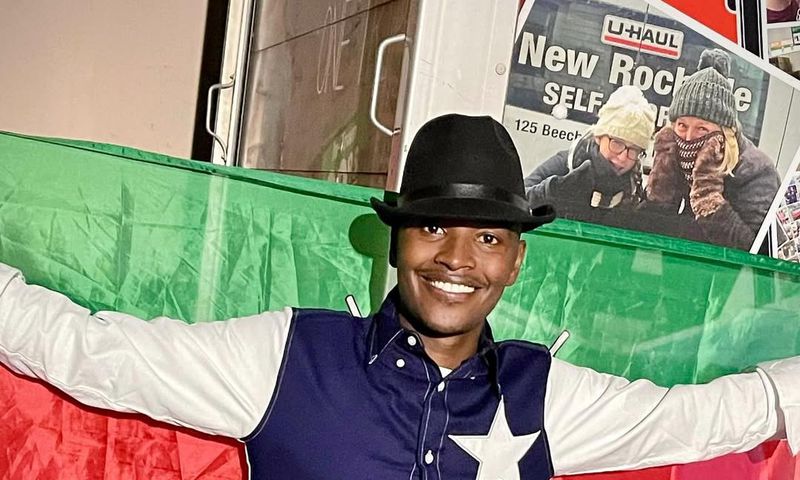Samidoh holding the Kenyan flag