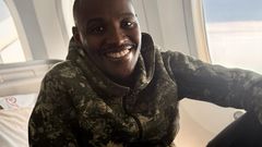 Musician and police officer Samidoh aboard a plane