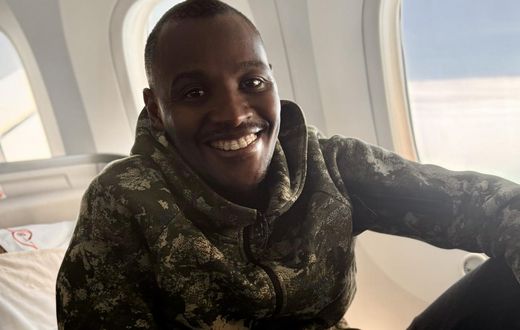 Musician and police officer Samidoh aboard a plane