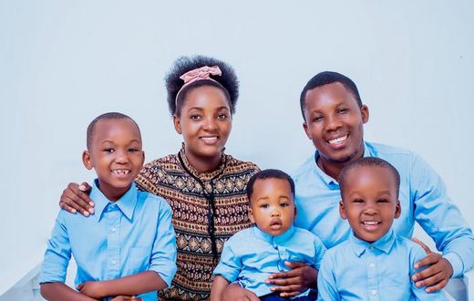 A past image of the late Gospel singer Marco Joseph with his wife and their children