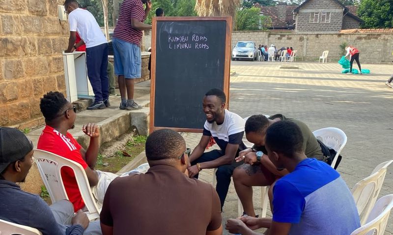 Attendees of the Average Joes 2024 event in a talk session