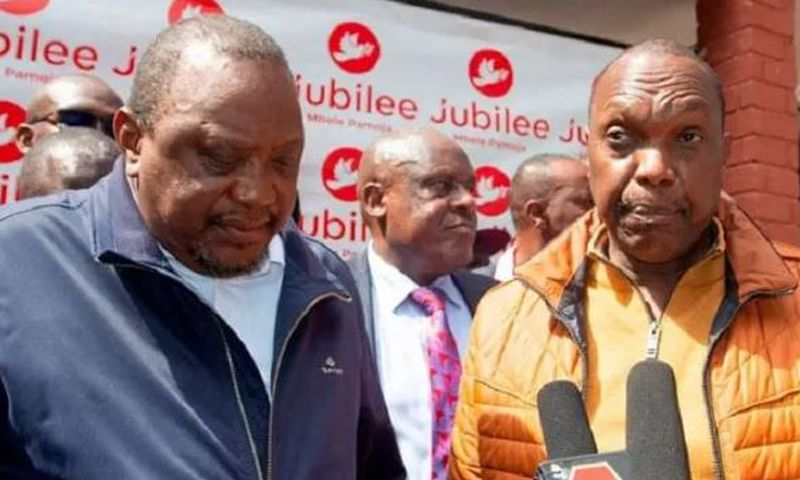 File image of retired President Uhuru Kenyatta and Jubilee Party Secretary General Jeremiah Kioni