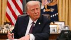 President Donald Trump signs an executive