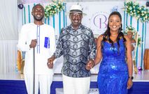Raila Odinga holding the hands of Becky Bett and her husband Abel during the couple’s traditional wedding in Kericho