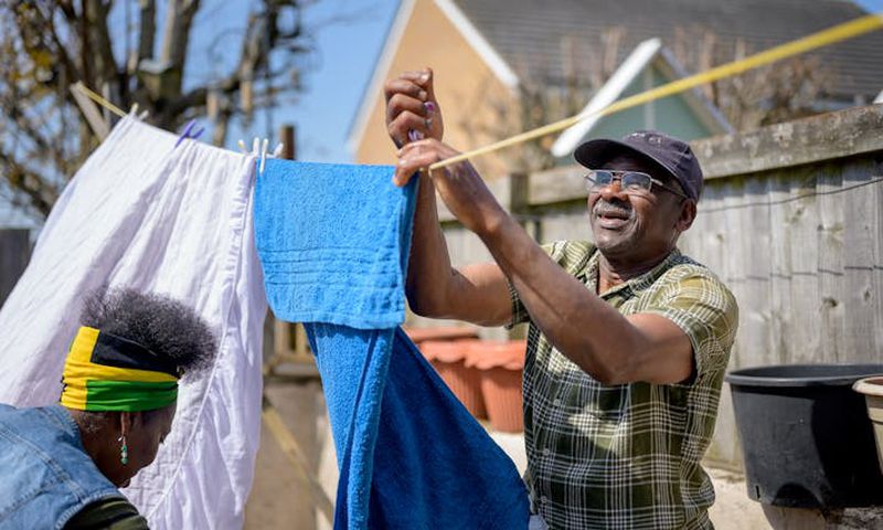 Retirees going about house chores [Image Credit: Centre for Ageing Better]