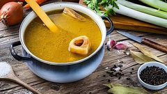 Served beef bone broth