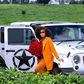 Actress Jackie Vike poses with her Jeep Wrangler