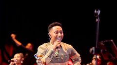 File image of Rwandan gospel musician Israel Mbonyi on stage