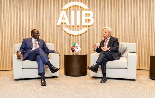 President William Ruto speaks with AIIB President and Board of Directors Chairman Jin Liqun