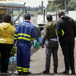 A Kenya Power employee at the scene of the Hillside Endarasha Academy fire