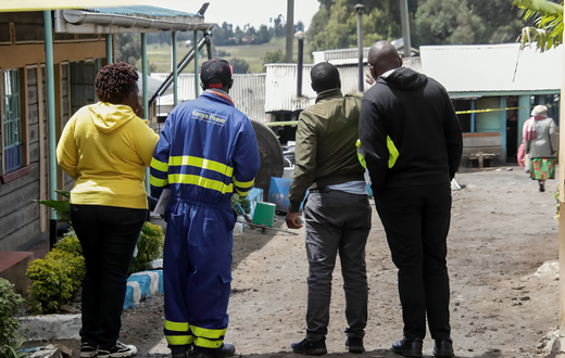 A Kenya Power employee at the scene of the Hillside Endarasha Academy fire