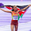Gold medalist Beatrice Chebet of Kenya celebrates after winning gold in women's 10,000m final at the 2024 Paris Olympic Games in Paris on August 9, 2024