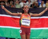 Gold medalist Beatrice Chebet of Kenya celebrates after winning gold in women's 10,000m final at the 2024 Paris Olympic Games in Paris on August 9, 2024