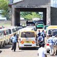 Vehicles lined up for inspection at an NTSA inspection centre