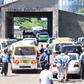 Vehicles lined up for inspection at an NTSA inspection centre