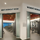 An AI-generated image of an Interior of a modern gym featuring separate workout rooms for men and women The gym is split into two distinct areas