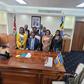 Wycliffe Oparanya with his family at his new office in the Ministry of Cabinet Secretary for Cooperatives and Micro, Small & Medium Enterprises (MSMEs) Development