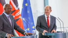 File image of President William Ruto (left) and German Chancellor Olaf Scholz (right)