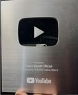 100,000 subsribers YouTube silver plaque for Fayez Bundi