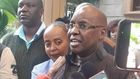 Jimi Wanjigi addressing the press alongside his wife Irene Nzisa Wanjigi after a raid at his Muthaiga home