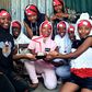 Huruma Town Kids holding their Pulse Influencer Awards plaque