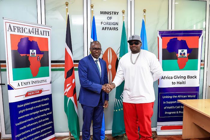 File image of Foreign Affairs Principal Secretary Dr. Korir Sing’oei with Khaligraph Jones who will be headlining the ‘Harmony for Haiti’ concert